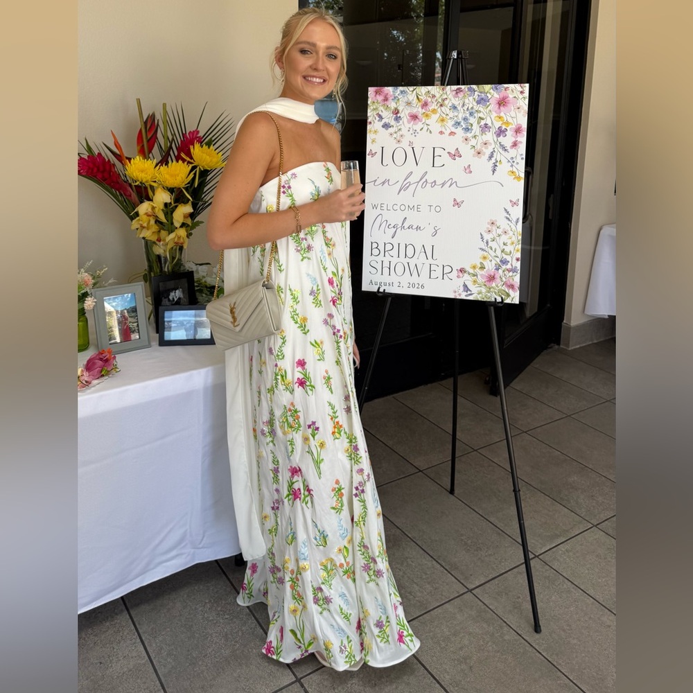Show Me Your MuMu White Floral Welcome Sign with Pink, Yellow & Purple Accents